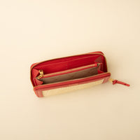 Open interior of red NatureHold Wallet handcrafted raffia and leather wallet by Danilo’s