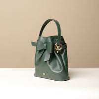 Angled view of green Premium leather Sandy Bag with shoulder strap