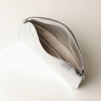 Open interior of silver Penelope Mini small leather handbag for versatile everyday use