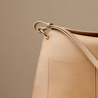 beige handcrafted designer purse