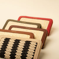 Close up view of Five NatureHold Wallet handcrafted raffia and leather wallet by Danilo’s