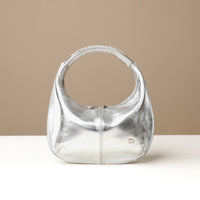 Front view of silver Soft Rounded Bag crescent leather top-handle handbag