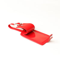 Red Close-up of Travel Identifying Tag leather texture