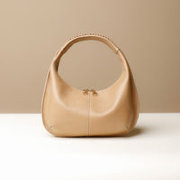 Back view of brown Soft Rounded Bag crescent leather top-handle handbag
