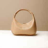 Front view of brown Soft Rounded Bag crescent leather top-handle handbag