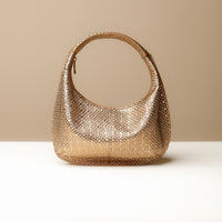 Back view of gold Soft Rounded Bag crescent leather top-handle handbag