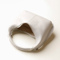 Open interior of Soft Rounded Bag crescent leather top-handle handbag