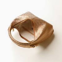 Open interior of gold Soft Rounded Bag crescent leather top-handle handbag