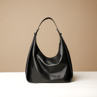 Back view of black Mia Minimale Sr. handcrafted luxury leather hobo bag
