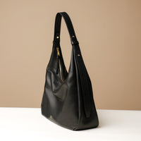 Side view of black Mia Minimale Sr. handcrafted luxury leather hobo bag