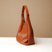 Side view of brown Mia Minimale Sr. handcrafted luxury leather hobo bag