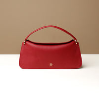 Front view of red Penelope Mini small leather handbag for versatile everyday use