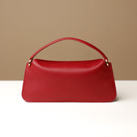 Back view of red Penelope Mini small leather handbag for versatile everyday use