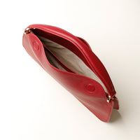 Open interior of Penelope Mini small leather handbag for versatile everyday use