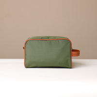 Back view of Green Fabricio leather toiletry bag with roomy interior and organized compartments, perfect for travel or everyday storage of essentials