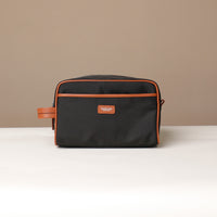 Front View of Black Fabricio leather toiletry bag with roomy interior and organized compartments, perfect for travel or everyday storage of essentials