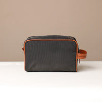 Back View of Black Fabricio leather toiletry bag with roomy interior and organized compartments, perfect for travel or everyday storage of essentials