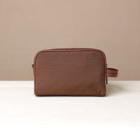 Back View of Brown Fabricio leather toiletry bag with roomy interior and organized compartments, perfect for travel or everyday storage of essentials