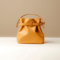 Back view of yellow Premium leather Sandy Bag with shoulder strap