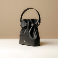 Side view of black Premium leather Sandy Bag with shoulder strap