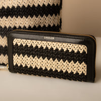 Close up of black NatureHold Wallet handcrafted raffia and leather wallet by Danilo’s