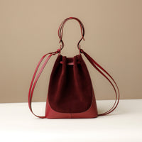 Red Suede Tulipa Bag – minimalist bucket-style handbag by Danilo’s