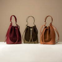 Three Suede Tulipa Bag – minimalist bucket-style handbag by Danilo’s in different variation
