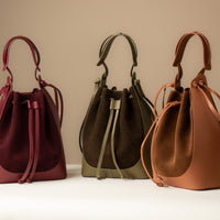 Collection of Suede Tulipa Bag – minimalist bucket-style handbag by Danilo’s