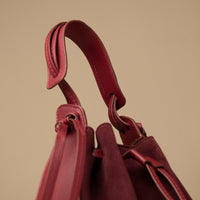 Close-up of drawstring tie on Suede Tulipa Bag