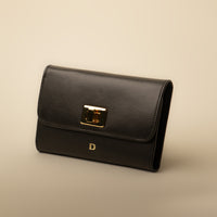 Front view of black Sherlyn Wallet tri-fold leather wallet by Danilo’s