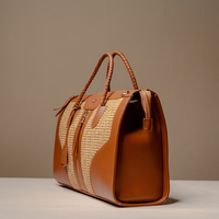 Angled View of Eva Sofia Bag handcrafted with premium leather and woven natural fibers by Danilos