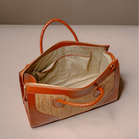 Open Eva Sofia Bag handcrafted with premium leather and woven natural fibers by Danilos