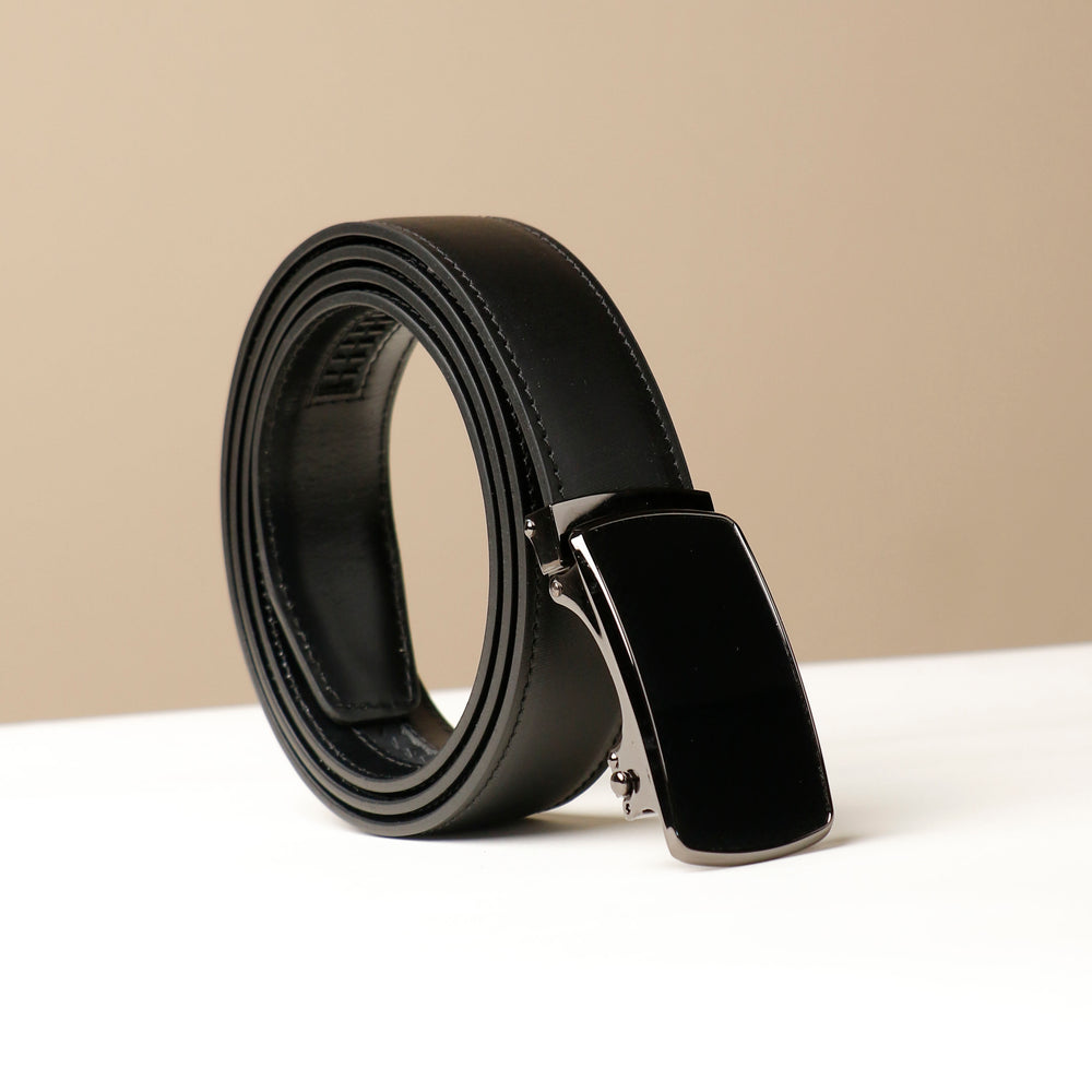 A black leather belt with a smooth finish and a metal buckle, displayed against a neutral background.