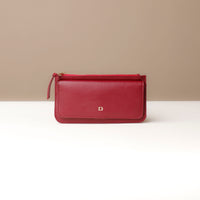 A collection of leather wallets in beige, brown, blue, and red colors, displayed stacked with the flap open on top.
