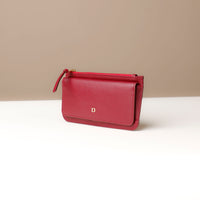 Red wallet on a neutral background