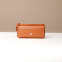 A collection of leather wallets in beige, brown, blue, and red colors, displayed stacked with the flap open on top.