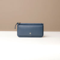 A collection of leather wallets in beige, brown, blue, and red colors, displayed stacked with the flap open on top.