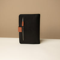 Globetrotters Document Holder black and tan pebbled leather with gold hardware, back side view