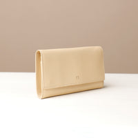 Side view of beige Organized leather wallet with water-resistant lining by Danilo’s