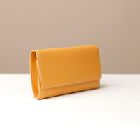 Side view of yellow VersaViva Clutch premium leather wallet and mobile holder by Danilo’s