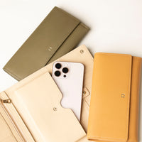 Three Organized leather wallet with water-resistant lining by Danilo’s with cellphone