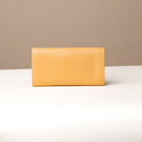 Back view of yellow VersaViva Clutch premium leather wallet and mobile holder by Danilo’s