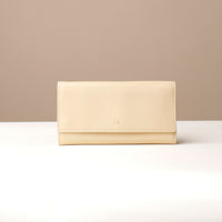 Front view of beige Organized leather wallet with water-resistant lining by Danilo’s