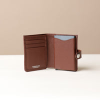 Open RFID card case showing aluminum pop-up holder and additional card slots