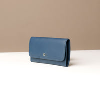 Blue wallet on a neutral background