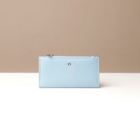 Assortment of Russet Wallets in black, blue, red, and beige colors, displayed flat on a white surface.