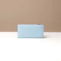 Light blue wallet on a neutral background