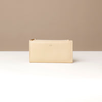 Assortment of Russet Wallets in black, blue, red, and beige colors, displayed flat on a white surface.