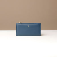 Assortment of Russet Wallets in black, blue, red, and beige colors, displayed flat on a white surface.