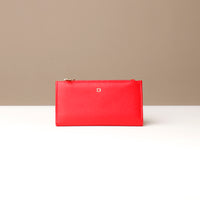 Assortment of Russet Wallets in black, blue, red, and beige colors, displayed flat on a white surface.